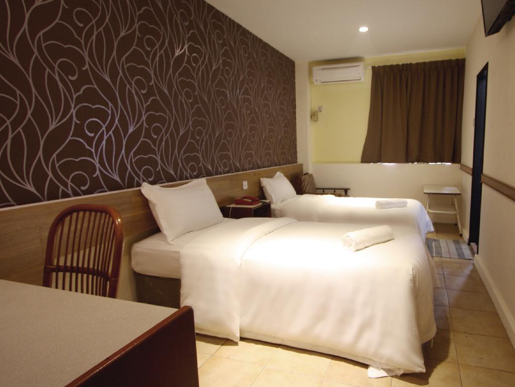Fata Garden Hotel By Place2Stay كوشنج الغرفة الصورة